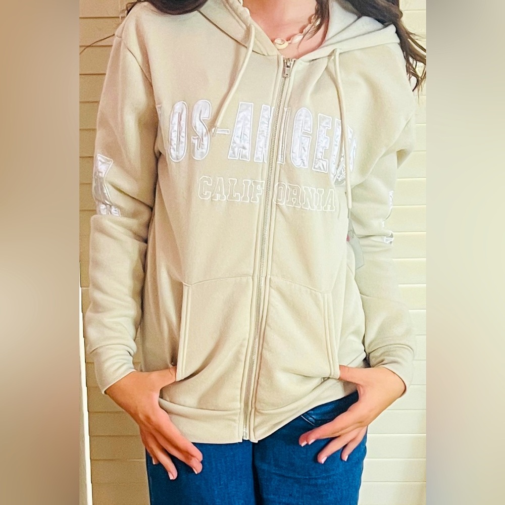 I am selling a soft, comfortable, and nice looking zip up jacket!